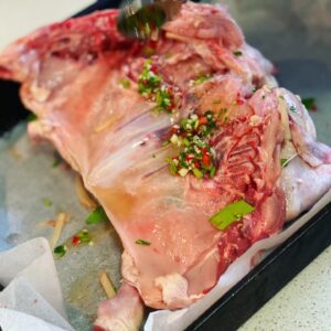 rub dipping liquid into the underside chicken
