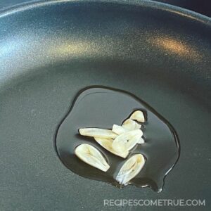 sesame oil and garlic in a pan