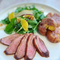 Duck breast with red wine, soy and orange sauce.